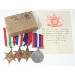 OC4533.)FOUR WWII BRITISH DECORATIONS IN THE ORIGINAL MAILER