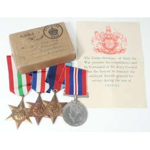 OC4533.)FOUR WWII BRITISH DECORATIONS IN THE ORIGINAL MAILER