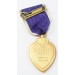 US4665.)CASED AND BOXED WWII PURPLE HEART MEDAL, NAMED KIA